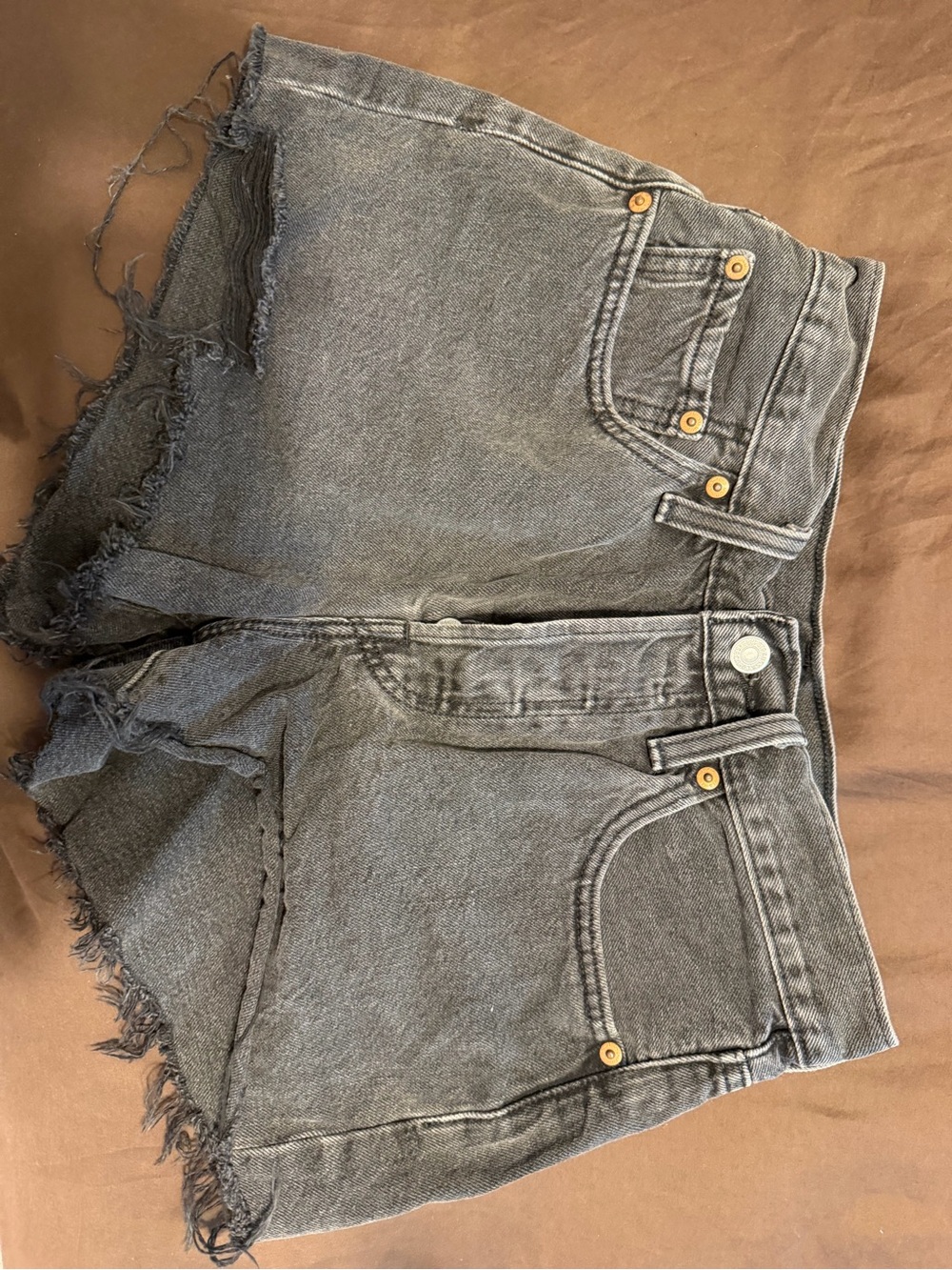 Levi's black denim shorts with frayed hem